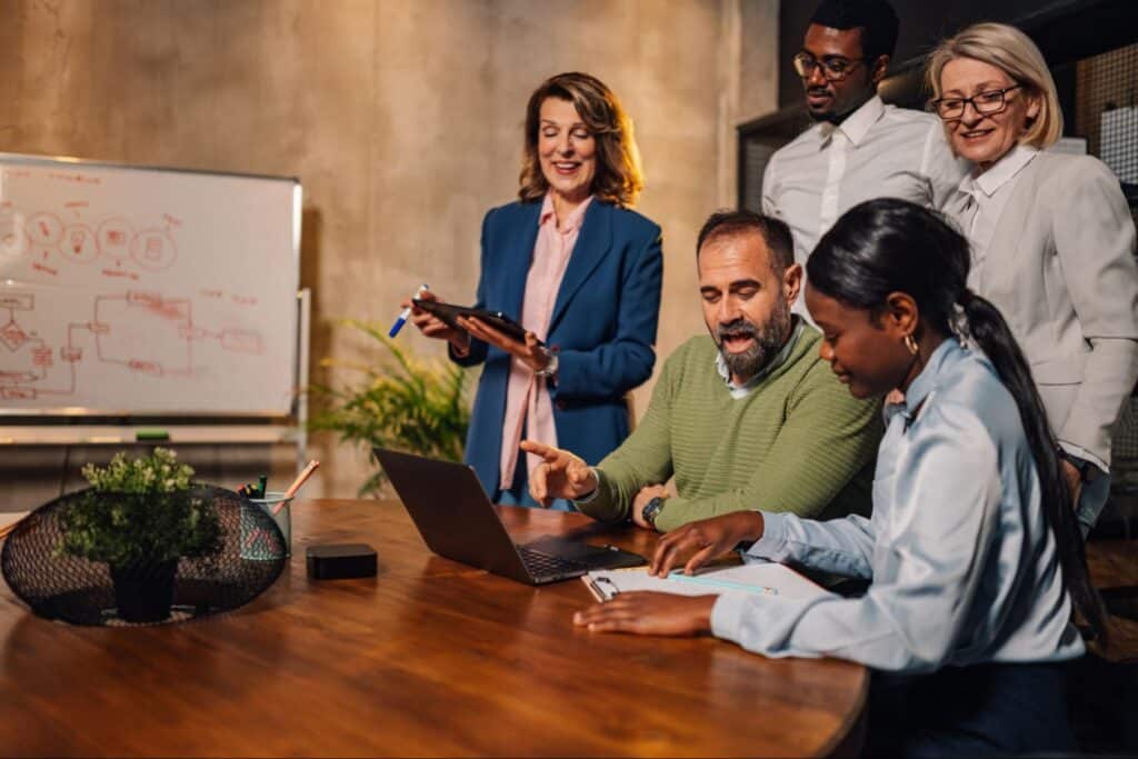 Team collaborating effectively to brainstorm innovative ideas in a productive work session.