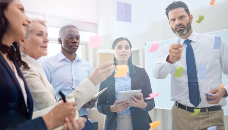 Team brainstorming session with creative ideas and sticky notes.